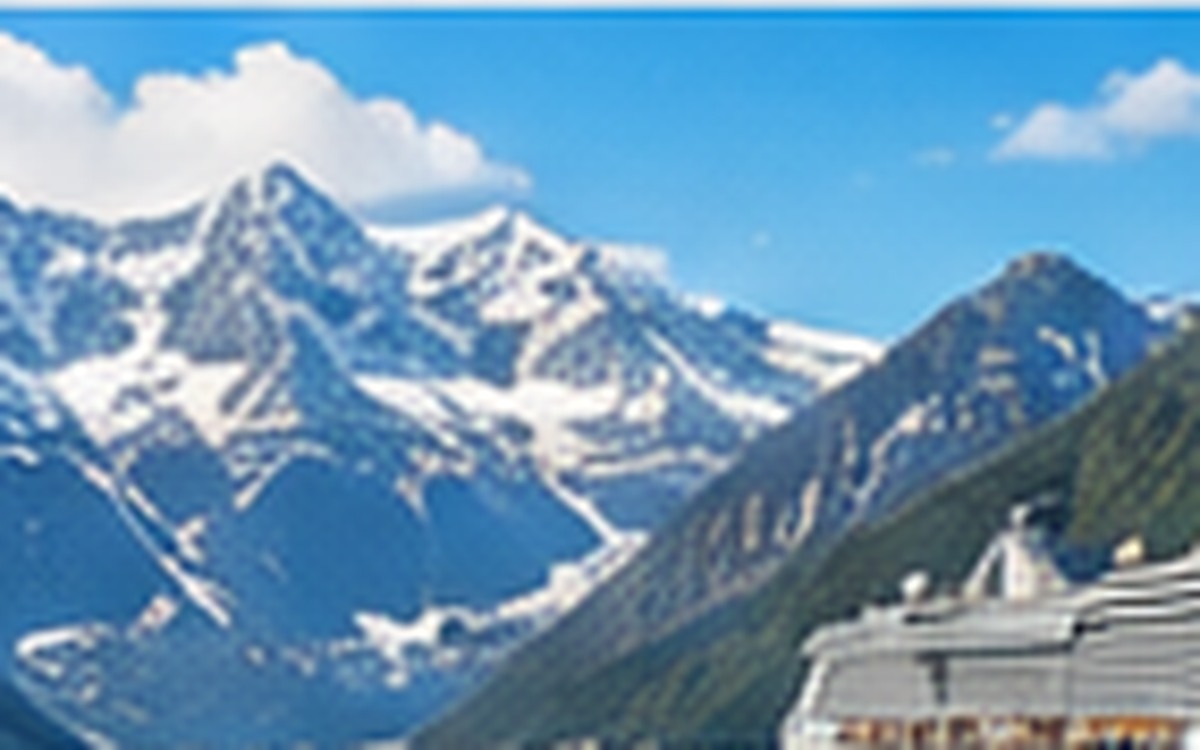 Cruise ship sailing through a scenic mountain passage